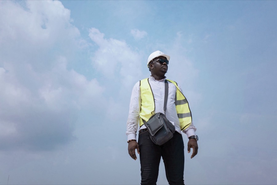 Vinok Energy site lead in a hard hat and safety vest